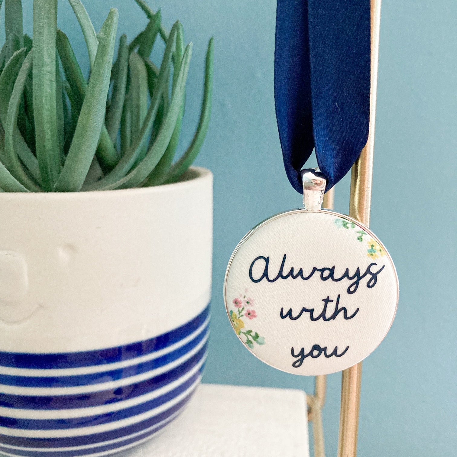 Always with you fabric keepsake hanging on a navy blue ribbon