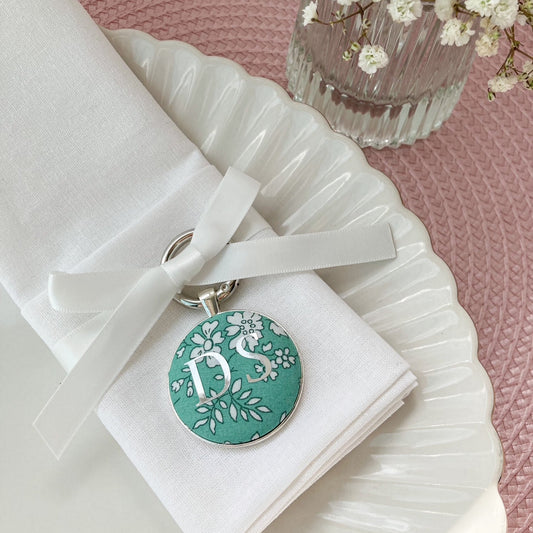 Wedding place setting and favour made with green floral Liberty fabric