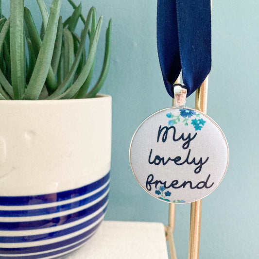 My lovely friend keepsake made with blue floral Liberty fabric, with a navy blue ribbon