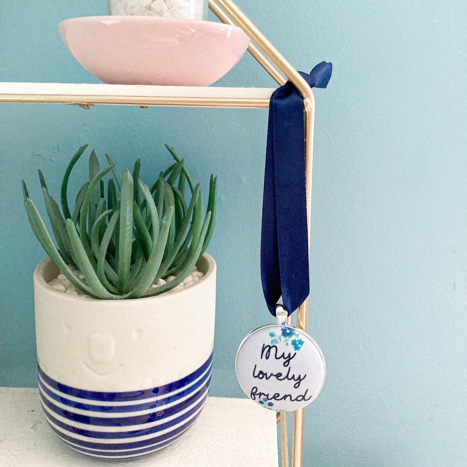 My lovely friend keepsake made with blue floral Liberty fabric, with a navy blue ribbon