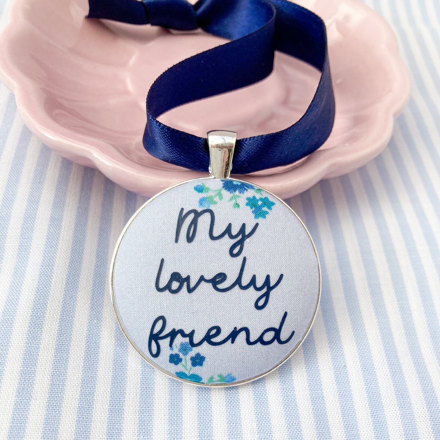 My lovely friend keepsake made with blue floral Liberty fabric, with a navy blue ribbon