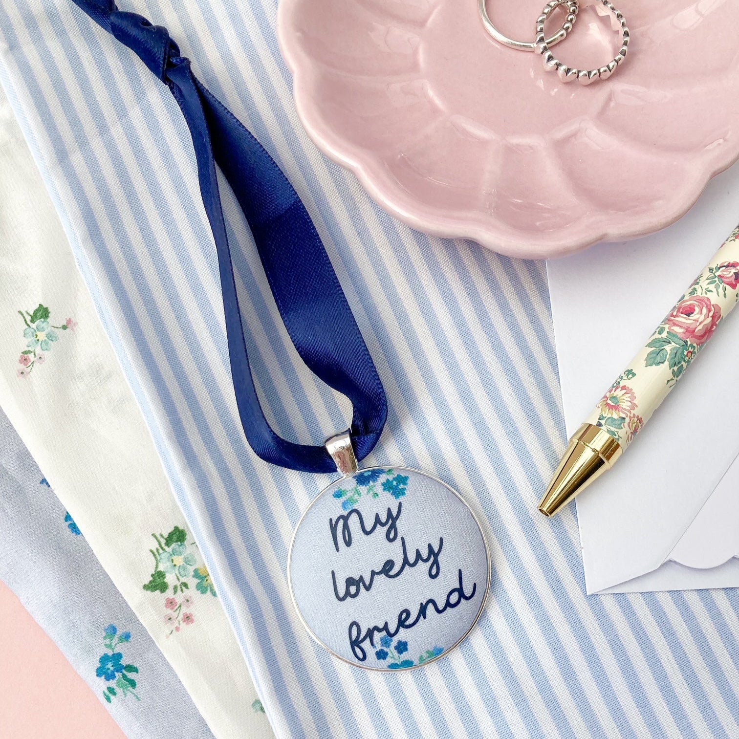 My lovely friend keepsake made with blue floral Liberty fabric, with a navy blue ribbon