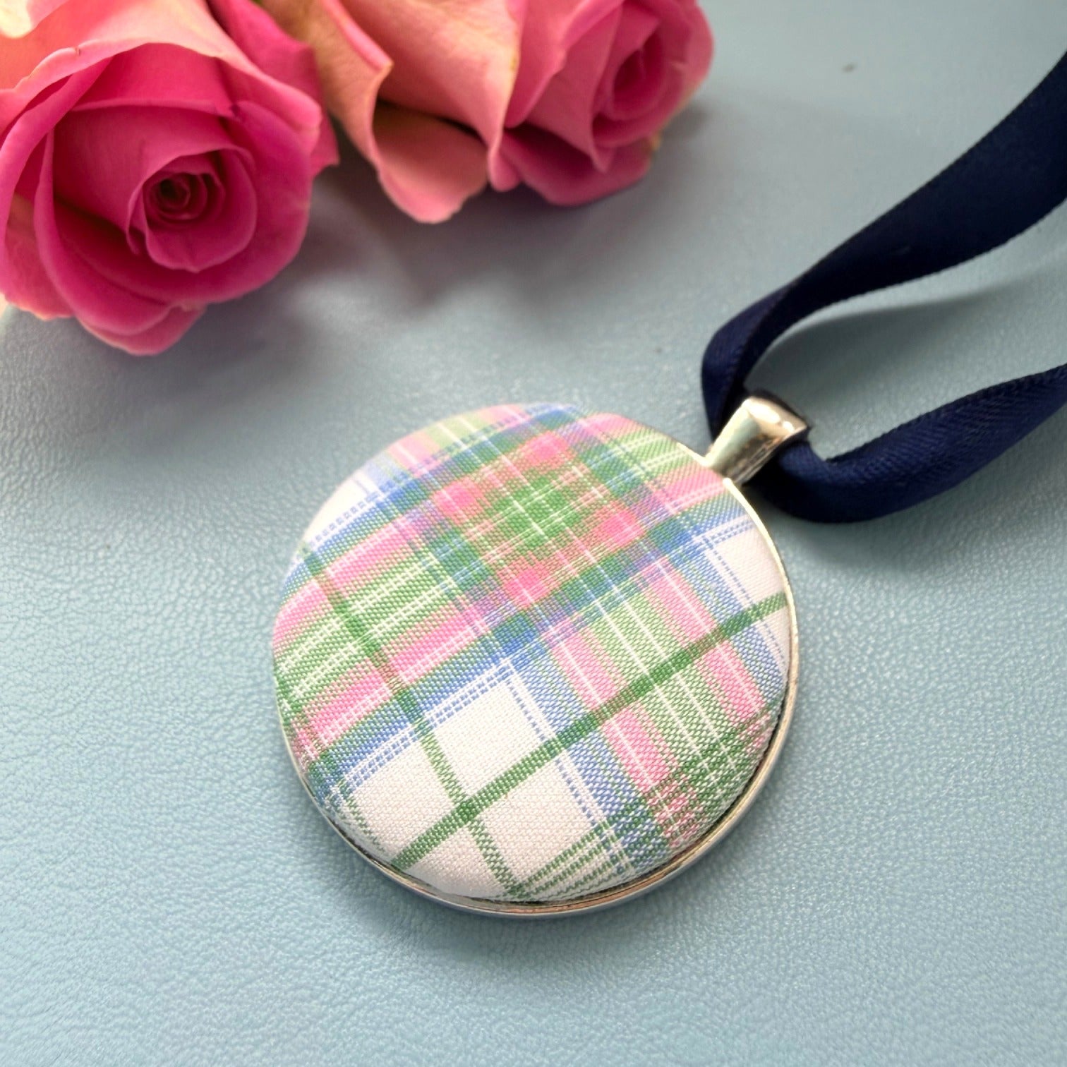 Memory fabric keepsake made with a dads checked shirt on a blue ribbon with a personalised fabric message