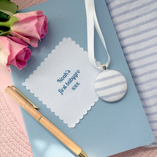First Babygro memory fabric keepsake thread on a white ribbon with a personalised fabric message