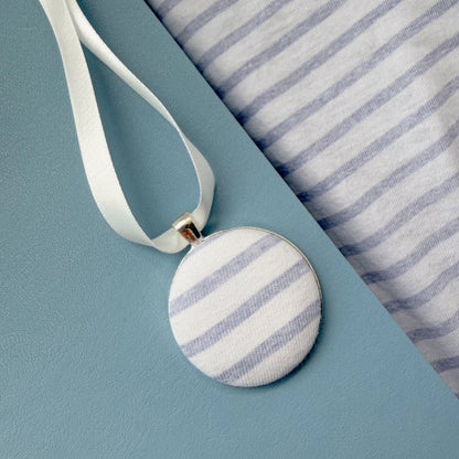 Tablecloth memory fabric keepsake thread on a white ribbon 