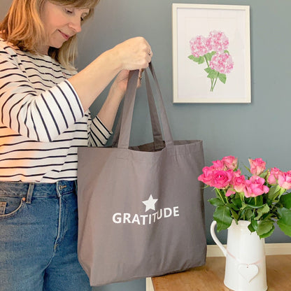 Grey large tote bag with Gratitude printed in white