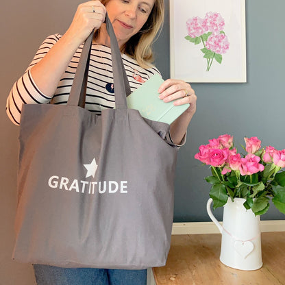 Large grey tote bag with the word Gratitude