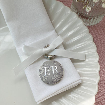Wedding place setting and favour made with grey floral Liberty fabric