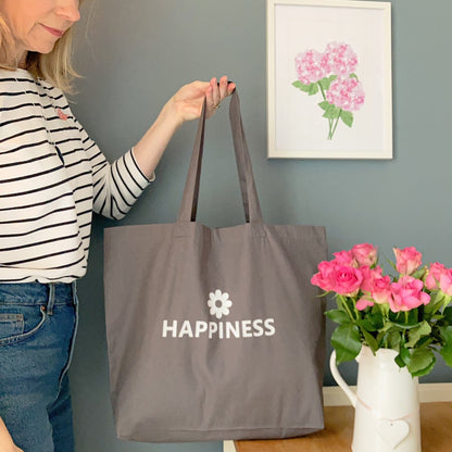 Large grey tote bag with Happiness printed in white