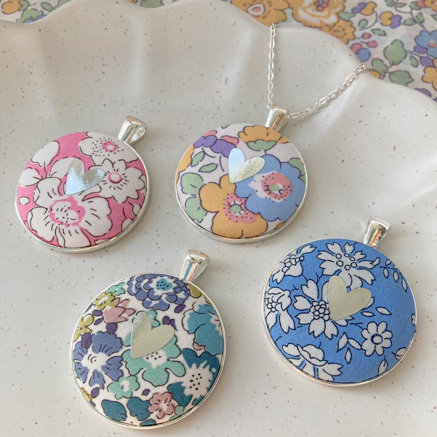 Heart necklaces made with Liberty floral fabrics