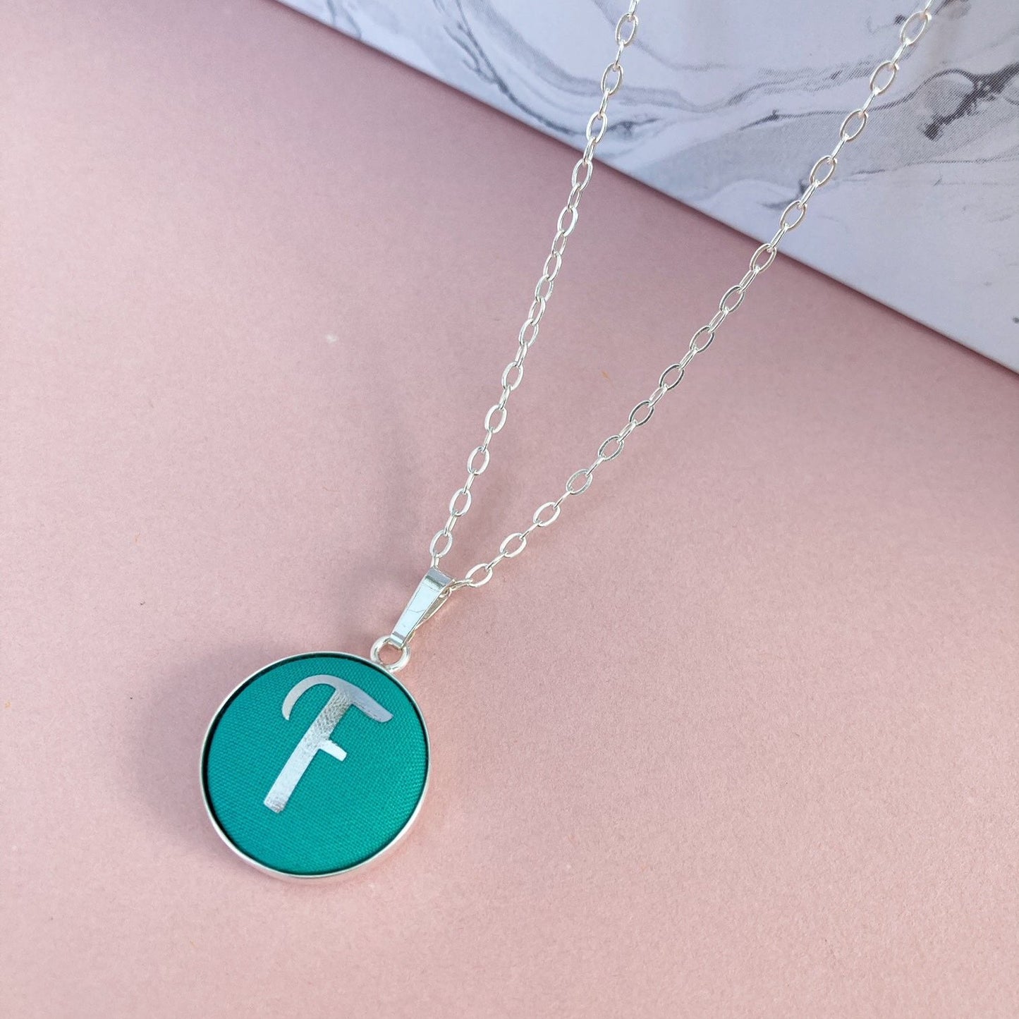 Personalised initial neckalce in green fabric