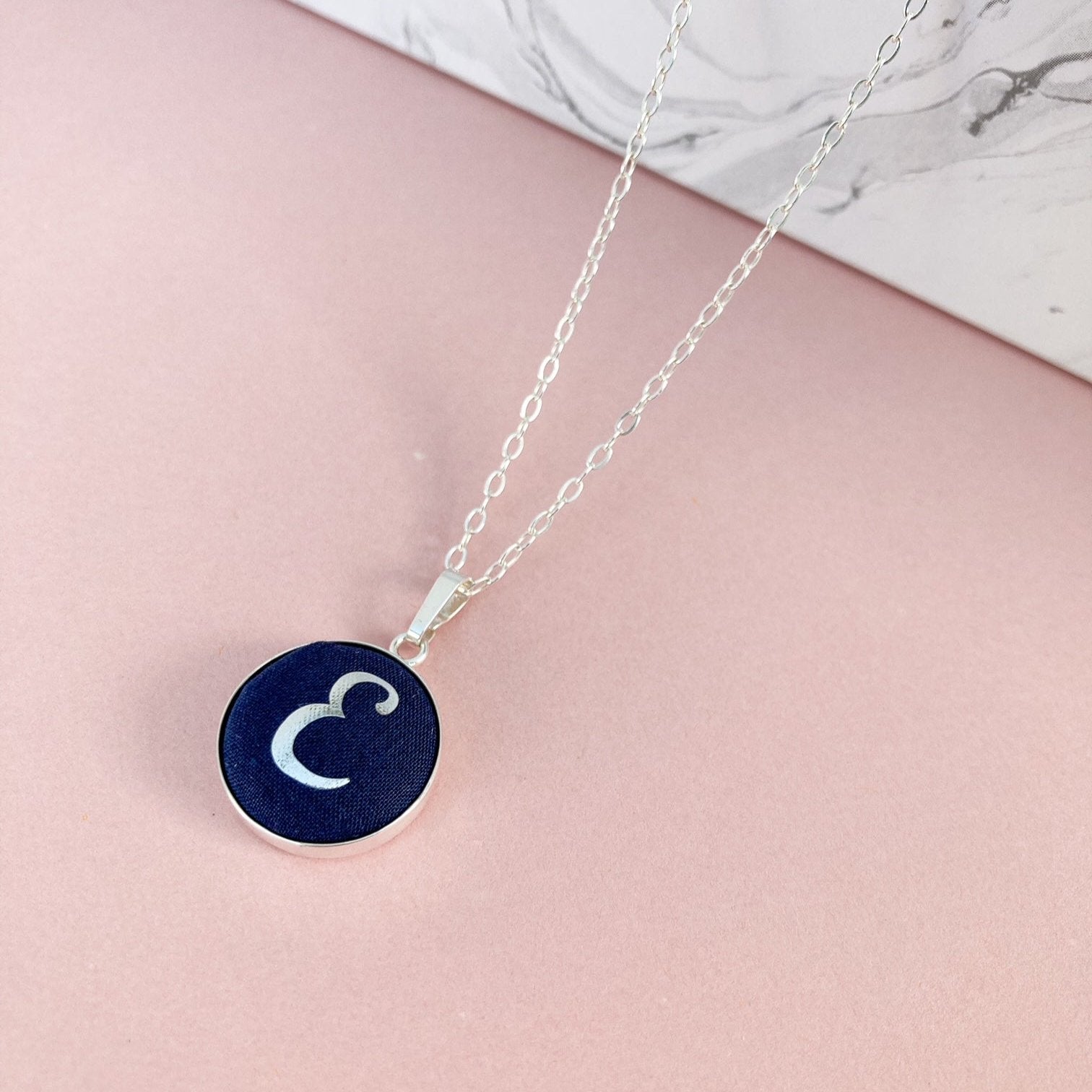 Initial necklace in navy blue