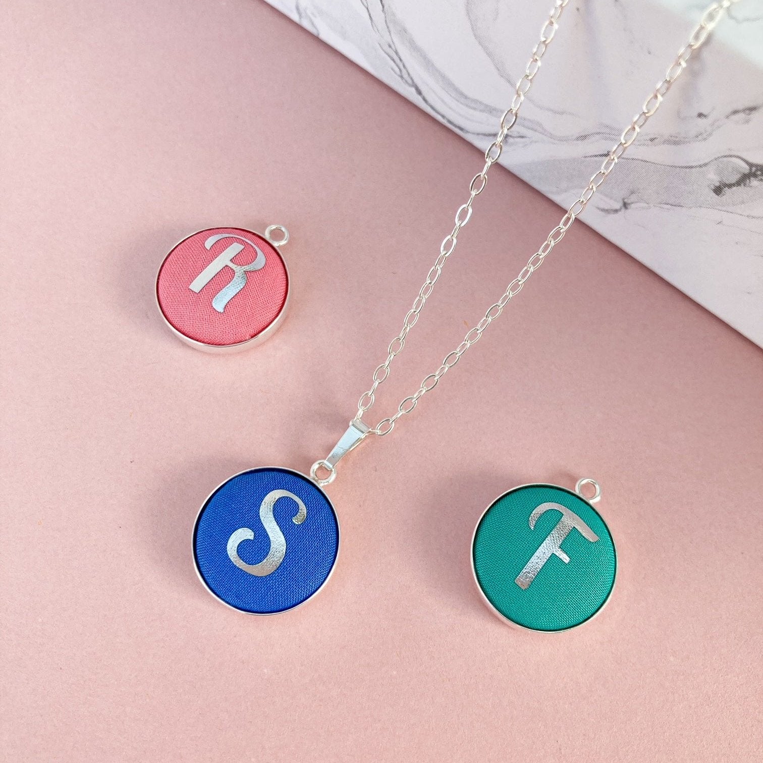 Personalised initial necklaces in bright fabrics shades