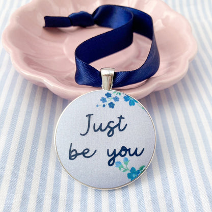 Just Be You Thoughtful Keepsake on blue floral Liberty fabric with a blue ribbon