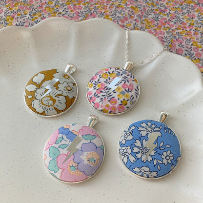 Lightning necklaces printed onto Liberty floral fabrics