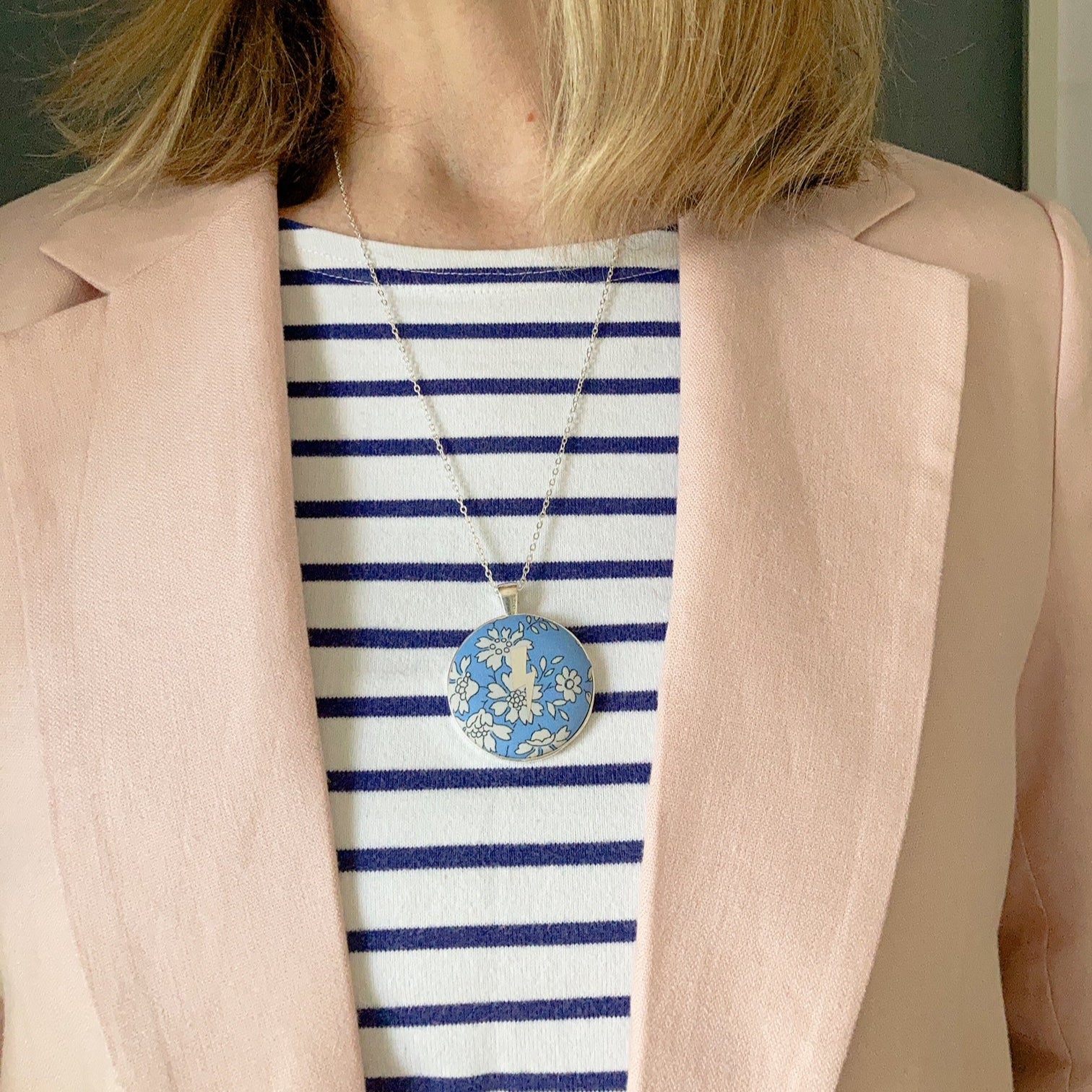 Lightning necklace worn with stripy top