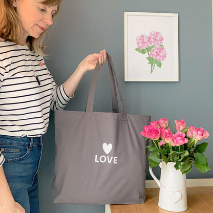 Large grey tote bag with Love printed in white