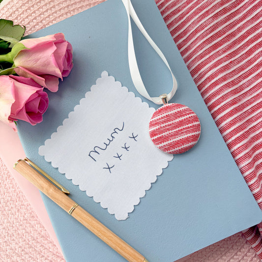 Mum fabric memory keepsake made with a stripy top, thread on a ribbon and with a fabric handwritten message