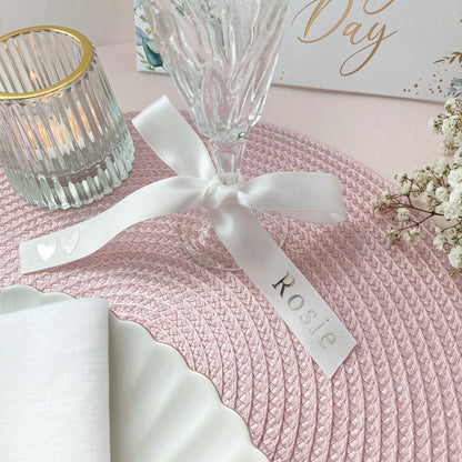 Personalised glass ribbons for wedding place setting in white stain with names in silver