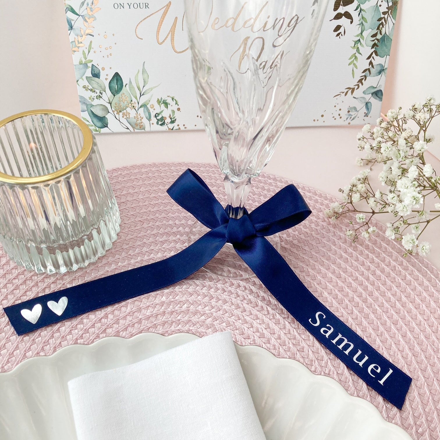 Personalised glass ribbons for wedding breakfast in navy blue with silver name