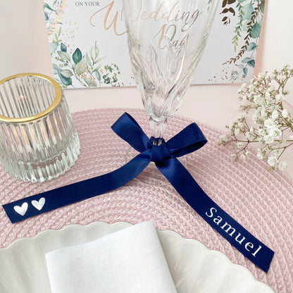 Personalised glass ribbons for wedding breakfast in navy blue with silver name