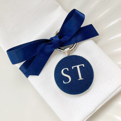 Personalised wedding breakfast and favour keyring in navy blue linen fabric with initials