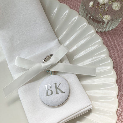 Personalised wedding place setting and favour in Linen white fabric
