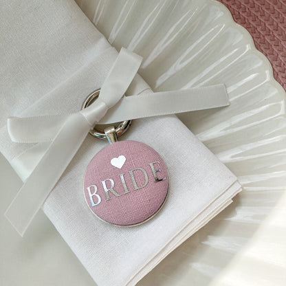 Pink bride wedding breakfast place setting and favour