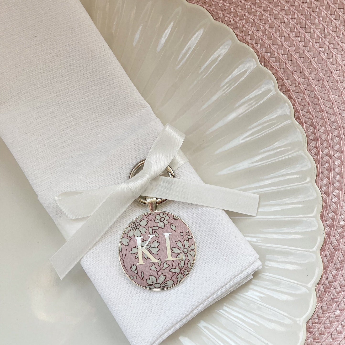 Pink floral wedding place setting and napkin ring made with pink floral Liberty fabric