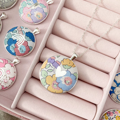 Liberty floral necklace with silver heart in a pink jewellery box