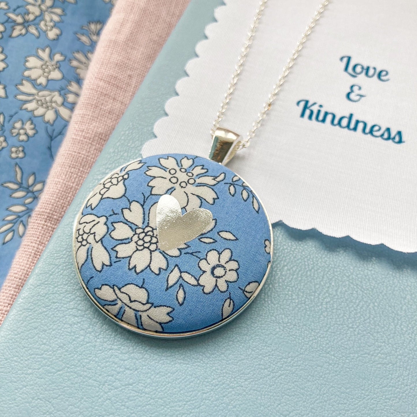 Blue floral necklace with silver heart