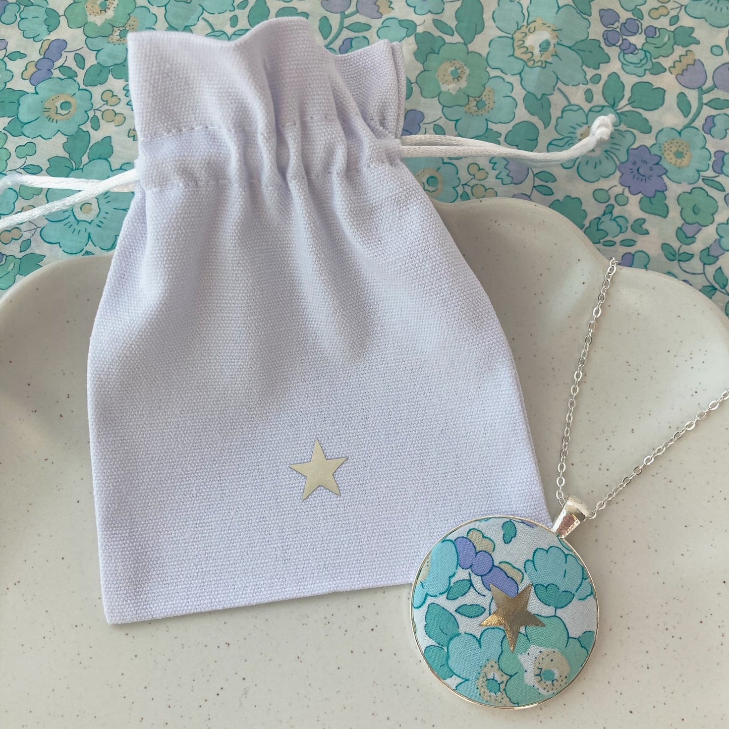 Star necklace made with aqua liberty fabric