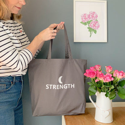 Strength tote bag