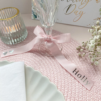 Wedding glass ribbons for place setting in pink satin with silver name