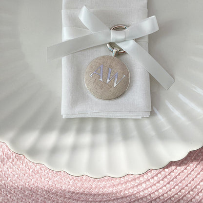 Wedding place setting and favour keyring in natural linen fabric with personalised initials