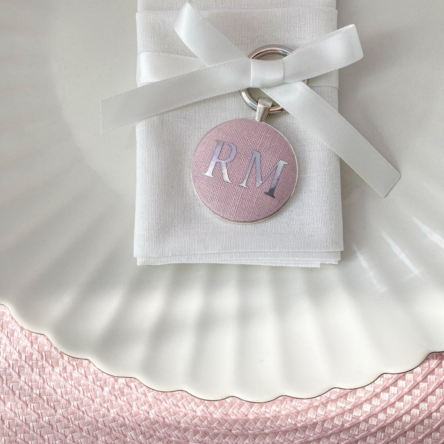 Wedding place setting and favour keyring in pink linen fabric