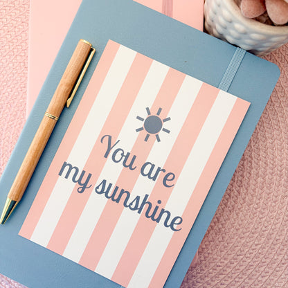 You are my sunshine postcard with a pink and white striped design